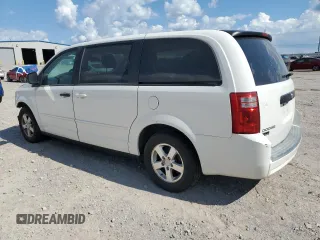 2009 Dodge Grand Caravan SE with VIN 1D8HN44E29B509835, listed as a Copart auction lot 56311925 with 105,108 mi miles and Salvage title. Bid and sale history available at DreamBid. Image 2.