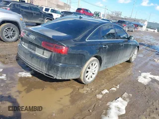 2016 Audi A6 Premium Plus z VIN WAUGFAFCXGN147215, wystawiony jako IAAI lot #41655394 z przebiegiem 143 357 mil mil oraz . Historia ofert i sprzedaży dostępna na DreamBid. Obrazek 4.