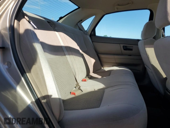 2004 Ford Taurus SE z VIN 1FAFP53284A156633, wystawiony jako Copart lot #58164985 z przebiegiem 91 246 mil mil oraz Szkoda całkowita • Salvage title. Historia ofert i sprzedaży dostępna na DreamBid. Obrazek 10.