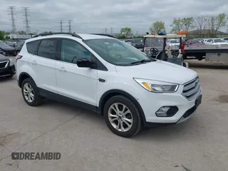 2018 Ford Escape SE z VIN 1FMCU9GDXJUC99453, wystawiony jako IAAI lot #42195202 z przebiegiem 191 840 mil mil oraz . Historia ofert i sprzedaży dostępna na DreamBid. Obrazek 1.
