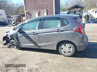 2018 Honda Fit LX z VIN 3HGGK5G44JM716592, wystawiony jako IAAI lot #41878820 z przebiegiem 70 464 mil mil oraz . Historia ofert i sprzedaży dostępna na DreamBid. Obrazek 14.