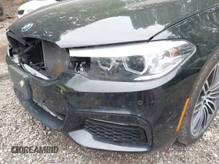 2018 BMW 5 Series 540i xDrive with VIN WBAJE7C58JG891098, listed as a IAAI auction lot 42331320 with 55,172 mi miles and . Bid and sale history available at DreamBid. Image 21.