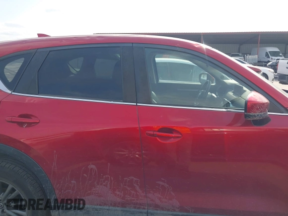 2017 Mazda CX-5 Touring with VIN JM3KFACL3H0195212, listed as a IAAI auction lot 42041361 with 57,377 mi miles and . Bid and sale history available at carsss.com. Image 13.