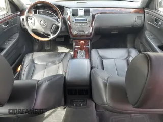 2008 Cadillac DTS 1SD z VIN 1G6KD57Y68U203116, wystawiony jako Copart lot #50050045 z przebiegiem 81 777 mil mil oraz Szkoda całkowita • Salvage title. Historia ofert i sprzedaży dostępna na DreamBid. Obrazek 8.