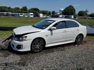 2017 Mitsubishi Lancer ES with VIN JA32V2FW8HU002843, listed as a Copart auction lot 65296254 with 67,310 mi miles and Salvage Title. Bid and sale history available at carsss.com. Image 1.