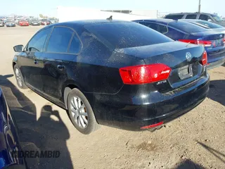 2012 Volkswagen Jetta Sedan SE w/Convenience with VIN 3VWDX7AJXCM069564, listed as a IAAI auction lot 41621734 with 155,649 mi miles. Bid and sale history available at carsss.com. Image 3.