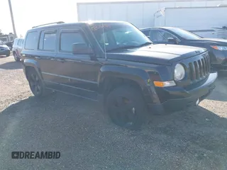 2014 Jeep Patriot Sport with VIN 1C4NJPBA2ED691131, listed as a IAAI auction lot 41470296 with 169,631 mi miles. Bid and sale history available at carsss.com. Image 1.