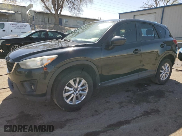 2015 Mazda CX-5 Touring with VIN JM3KE4CY3F0435422, listed as a Copart auction lot 51835575 with 185,727 mi miles and Salvage Title. Bid and sale history available at DreamBid. Image 1.
