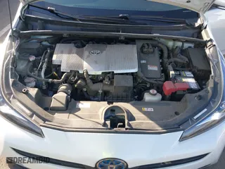 2021 Toyota Prius L Eco with VIN JTDKAMFU7M3133544, listed as a IAAI auction lot 41548653 with 115,214 mi miles. Bid and sale history available at carsss.com. Image 10.