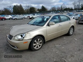 2008 Kia Optima LX z VIN KNAGE124985210940, wystawiony jako Copart lot #45143605 z przebiegiem 121 851 mil mil oraz Szkoda całkowita • Salvage title. Historia ofert i sprzedaży dostępna na DreamBid. Obrazek 1.