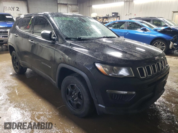 2019 Jeep Compass Sport with VIN 3C4NJDAB0KT802788, listed as a Copart auction lot 39840144 with 121,229 mi miles and Salvage title. Bid and sale history available at DreamBid. Image 4.