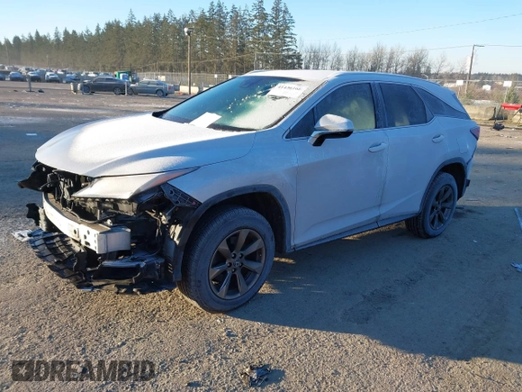 2018 Lexus RX 350L Premium z VIN JTJDZKCAXJ2008164, wystawiony jako IAAI lot #41436168 z przebiegiem 126 798 mil mil oraz . Historia ofert i sprzedaży dostępna na DreamBid. Obrazek 22.