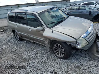 2005 Suzuki XL7 LX z VIN JS3TX92V854105506, wystawiony jako Copart lot #60683524 z przebiegiem 197 035 mil mil oraz Szkody całkowita. Historia ofert i sprzedaży dostępna na DreamBid. Obrazek 4.