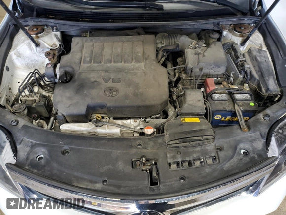 2015 Toyota Avalon Limited with VIN 4T1BK1EB6FU186515, listed as a Copart auction lot 54027865 with 104,000 mi miles and Salvage Title. Bid and sale history available at DreamBid. Image 11.