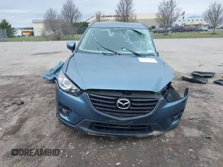 2016 Mazda CX-5 Touring with VIN JM3KE4CY8G0858045, listed as a IAAI auction lot 41941537 with 103,532 mi miles. Bid and sale history available at carsss.com. Image 12.