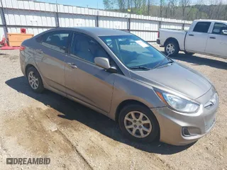 2014 Hyundai Accent GLS with VIN KMHCT4AE3EU671681, listed as a IAAI auction lot 41849423 with 208,710 mi miles. Bid and sale history available at carsss.com. Image 1.