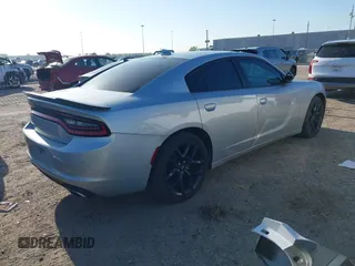 2021 Dodge Charger SXT with VIN 2C3CDXBG0MH562538, listed as a IAAI auction lot 41877128 with 54,934 mi miles and . Bid and sale history available at DreamBid. Image 4.