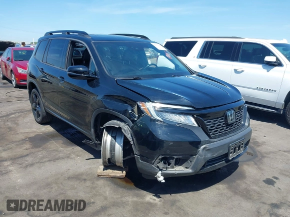 2021 Honda Passport Elite with VIN 5FNYF8H07MB003506, listed as a IAAI auction lot 42571906 with 42,323 mi miles and . Bid and sale history available at DreamBid. Image 1.