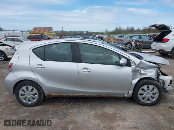 2012 Toyota Prius One z VIN JTDKDTB31C1515979, wystawiony jako IAAI lot #42113818 z przebiegiem 184 528 mil mil oraz . Historia ofert i sprzedaży dostępna na DreamBid. Obrazek 14.