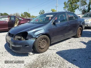 2009 Volkswagen Jetta S z VIN 3VWJM71K29M169879, wystawiony jako Copart lot #53472585 z przebiegiem 221 924 mil mil oraz Szkoda całkowita • Salvage title. Historia ofert i sprzedaży dostępna na DreamBid. Obrazek 1.