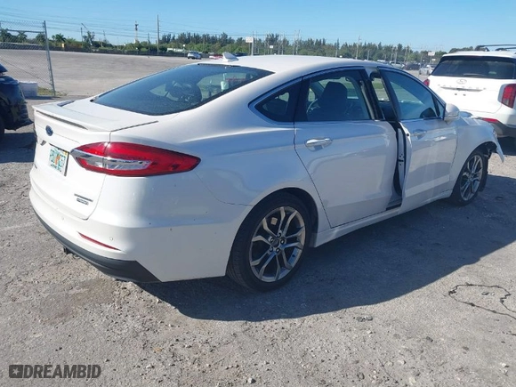 2020 Ford Fusion Hybrid Titanium with VIN 3FA6P0RU4LR182226, listed as a IAAI auction lot 41748021 with 69,234 mi miles. Bid and sale history available at carsss.com. Image 4.