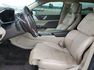 2017 Lincoln Continental Reserve with VIN 1LN6L9NC2H5614888, listed as a Copart auction lot 82712404 with 104,893 mi miles and Salvage Title. Bid and sale history available at DreamBid. Image 7.