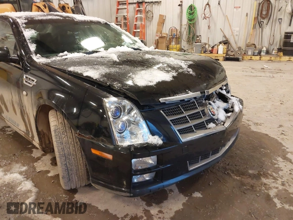 2010 Cadillac STS AWD with VIN 1G6DU6EV2A0125065, listed as a IAAI auction lot 41229886 with 84,954 mi miles and . Bid and sale history available at DreamBid. Image 18.