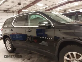 2018 Chevrolet Traverse LT Cloth z VIN 1GNEVGKW2JJ232734, wystawiony jako IAAI lot #41931040 z przebiegiem 91 580 mil mil oraz . Historia ofert i sprzedaży dostępna na DreamBid. Obrazek 14.