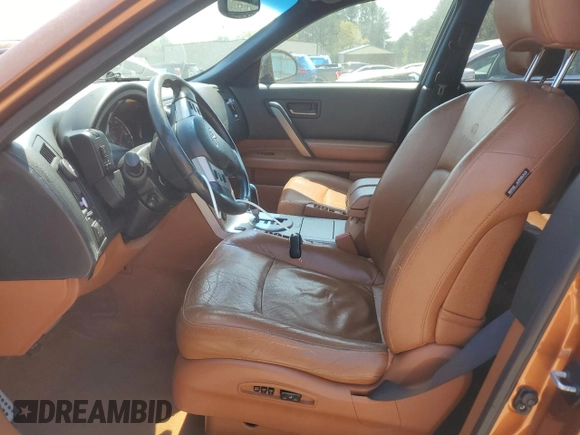 2004 Infiniti FX with VIN JNRAS08W54X224093, listed as a Copart auction lot 54013415 with 195,797 mi miles and Salvage Title. Bid and sale history available at DreamBid. Image 7.