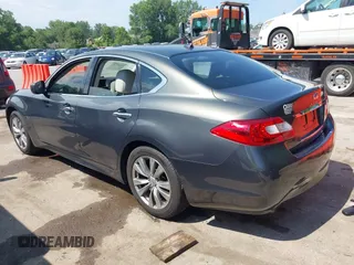 2012 Infiniti M Hybrid with VIN JN1EY1AP4CM910962, listed as a IAAI auction lot 42597542 with 187,171 mi miles and . Bid and sale history available at DreamBid. Image 3.