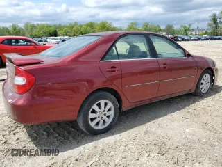2003 Toyota Camry LE z VIN JTDBF30K530091667, wystawiony jako Copart lot #54576175 z przebiegiem 230 772 mil mil oraz Czysty tytuł • Clean title. Historia ofert i sprzedaży dostępna na DreamBid. Obrazek 3.