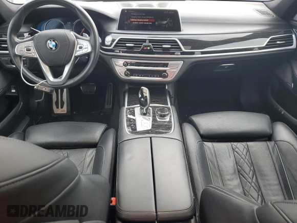 2018 BMW 7 Series 740e xDrive with VIN WBA7J2C59JB246238, listed as a Copart auction lot 53777335 with 76,642 mi miles and Salvage Title. Bid and sale history available at carsss.com. Image 8.