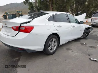 2019 Chevrolet Malibu LS with VIN 1G1ZB5STXKF220180, listed as a IAAI auction lot 42067383 with 128,325 mi miles and . Bid and sale history available at DreamBid. Image 4.