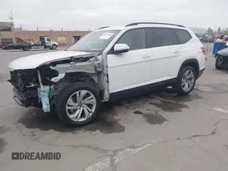 2022 Volkswagen Atlas SE with VIN 1V2WR2CA2NC517904, listed as a IAAI auction lot 42110920 with 34,799 mi miles and . Bid and sale history available at DreamBid. Image 2.