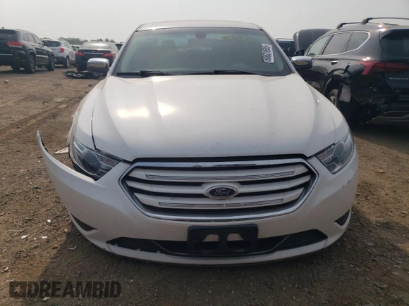 2016 Ford Taurus Limited with VIN 1FAHP2F8XGG124551, listed as a Copart auction lot 60621695 with 103,668 mi miles and Salvage title. Bid and sale history available at DreamBid. Image 5.