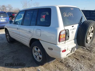 2000 Toyota RAV4 with VIN JT3GP10VXY7065795, listed as a IAAI auction lot 41792644 with 176,444 mi miles and . Bid and sale history available at DreamBid. Image 3.