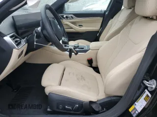 2024 BMW i4 eDrive35 with VIN WBY43AW05RFS84773, listed as a Copart auction lot 54974024 with 2,942 mi miles and Salvage Title. Bid and sale history available at carsss.com. Image 7.