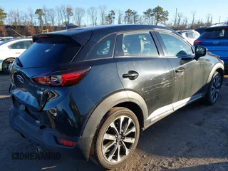 2019 Mazda CX-3 Grand Touring z VIN JM1DKFD78K0417780, wystawiony jako IAAI lot #41573009 z przebiegiem 70 002 mil mil oraz . Historia ofert i sprzedaży dostępna na DreamBid. Obrazek 4.