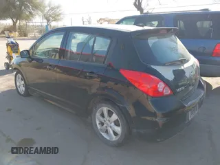 2012 Nissan Versa S with VIN 3N1BC1CP3CL360582, listed as a IAAI auction lot 41773403 with 148,525 mi miles. Bid and sale history available at carsss.com. Image 3.
