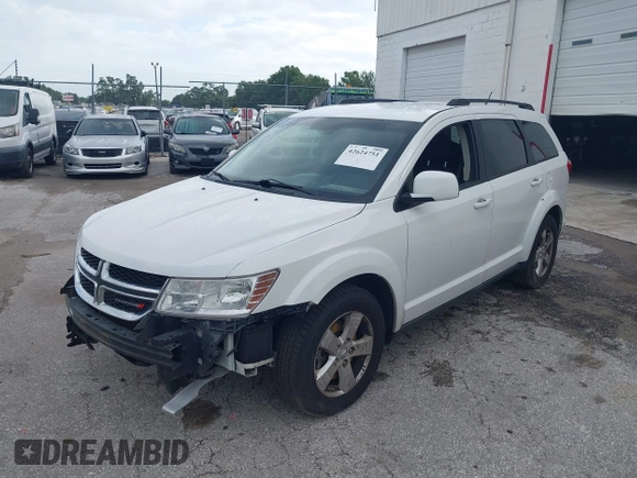 2012 Dodge Journey SXT with VIN 3C4PDCBG3CT331693, listed as a IAAI auction lot 42624751 with 165,480 mi miles and . Bid and sale history available at DreamBid. Image 2.