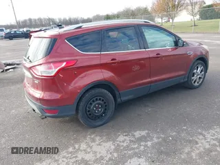 2015 Ford Escape Titanium with VIN 1FMCU9J91FUA26624, listed as a IAAI auction lot 40854175 with 132,313 mi miles. Bid and sale history available at carsss.com. Image 4.
