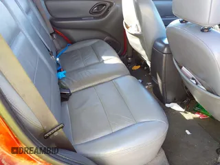 2005 Ford Escape Hybrid with VIN 1FMYU96H05KE01130, listed as a IAAI auction lot 41711338 with 288,964 mi miles. Bid and sale history available at carsss.com. Image 8.