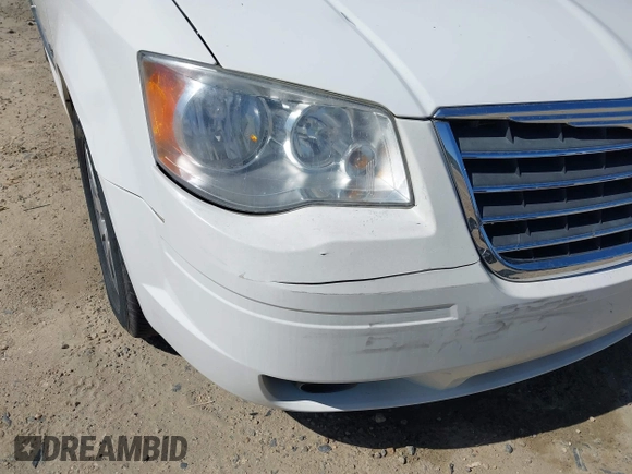 2009 Chrysler Town & Country Touring with VIN 2A8HR54X89R642118, listed as a IAAI auction lot 41844247 with 161,651 mi miles and . Bid and sale history available at DreamBid. Image 17.