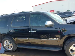 2009 Chevrolet Tahoe LTZ z VIN 1GNFC33J69R285570, wystawiony jako IAAI lot #41701424 z przebiegiem 165 811 mil mil oraz . Historia ofert i sprzedaży dostępna na DreamBid. Obrazek 13.