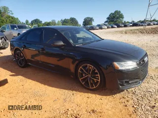 2017 Audi S8 z VIN WUAJ5AFD6HN900019, wystawiony jako Copart lot #61722034 z przebiegiem 103 356 mil mil oraz Szkody całkowita. Historia ofert i sprzedaży dostępna na DreamBid. Obrazek 4.