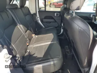 2021 Jeep Wrangler Unlimited Sahara z VIN 1C4JJXP63MW720948, wystawiony jako Copart lot #57115825 z przebiegiem 33 391 mil mil oraz Szkoda całkowita • Salvage title. Historia ofert i sprzedaży dostępna na DreamBid. Obrazek 11.