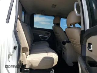 2016 Nissan Titan Platinum Reserve z VIN 1N6BA1F41GN504539, wystawiony jako Copart lot #64812975 z przebiegiem 143 144 mil mil oraz Szkoda całkowita • Salvage title. Historia ofert i sprzedaży dostępna na DreamBid. Obrazek 10.