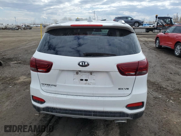 2019 Kia Sorento EX z VIN 5XYPHDA54KG606987, wystawiony jako Copart lot #53133465 z przebiegiem 102 446 mil mil oraz Szkoda całkowita • Salvage title. Historia ofert i sprzedaży dostępna na DreamBid. Obrazek 6.