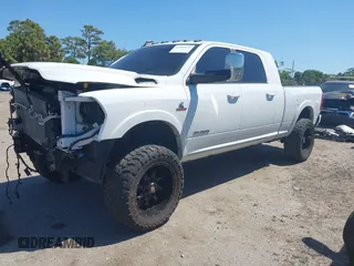 2019 Ram 2500 Laramie z VIN 3C6UR5NL2KG718789, wystawiony jako IAAI lot #42046325 z przebiegiem 54 965 mil mil oraz . Historia ofert i sprzedaży dostępna na DreamBid. Obrazek 2.
