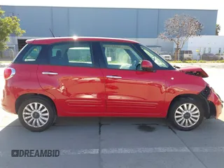2014 FIAT 500L Easy with VIN ZFBCFABH7EZ024144, listed as a IAAI auction lot 41669080 with 113,268 mi miles and . Bid and sale history available at DreamBid. Image 14.